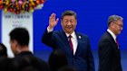 Chinese President Xi Jinping waves as he arrives at the opening ceremony for the World AI Conference in Shanghai.