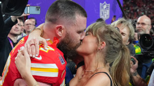 Kelce and Swift kiss after the Kansas City Chiefs defeated San Francisco 49ers in the Super Bowl.