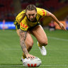 Julia Robinson crosses for one of her six tries for the Jillaroos against Papua New Guinea.