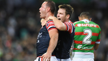 Luke Keary and Boyd Cordner celebrate after they combined for a try against the Rabbitohs.