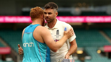 Jonny Bairstow and Jimmy Anderson embrace after the SCG draw. 
