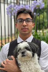 Rishi Arora from Normanhurst Boys High School and his dog Scruffy.