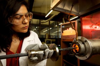 Professor Veena Sahajwalla, at a laboratory furnace at the UNSW SMaRT Centre.
