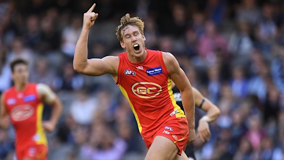 Sun shines: Tom Lynch kicked a bag of eight for Gold Coast against Carlton.