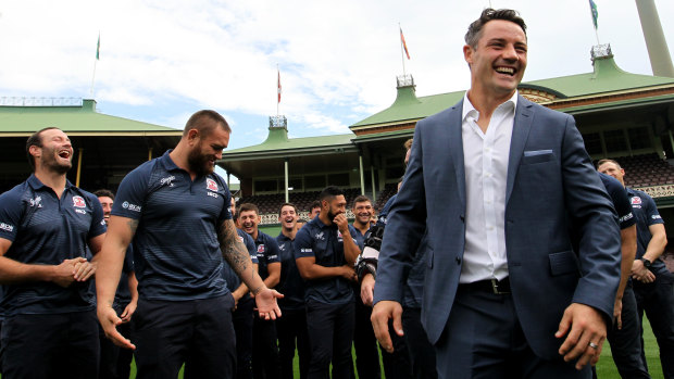 Support players: The entire Roosters squad gathers for Cooper Cronk's retirement announcement on Monday.