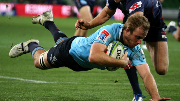 Lottery winners: Will Miller scores a try against the Rebels.