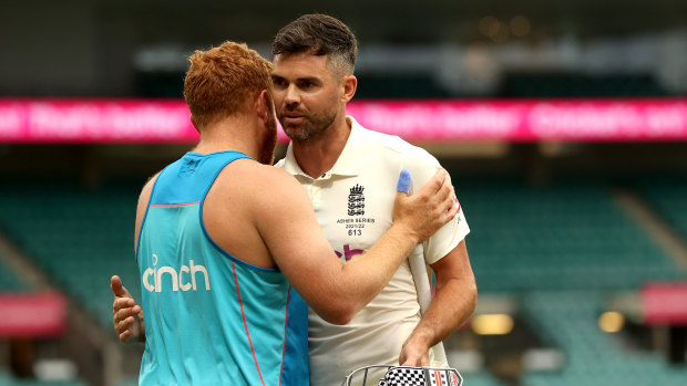 Jonny Bairstow and Jimmy Anderson embrace after the SCG draw. 