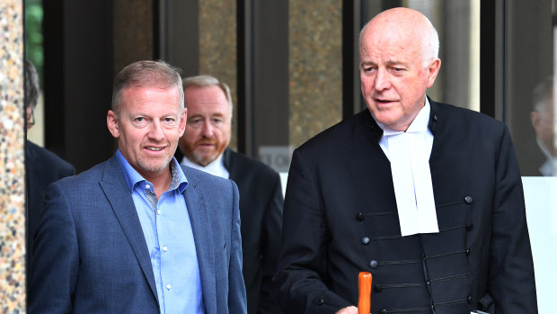 Sam Oliver's father Chris Oliver, left, and Stuart Littlemore, QC, leave the Federal Court in Sydney in March.