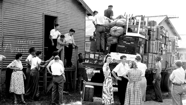 The belongings of reluctant European migrants are loaded onto a truck at Bradfield Park after authorities ordered them to be relocated to other camps to make way for new arrivals from Britain in 1951.
