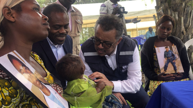 WHO Director-General, Dr Tedros Adhanom Ghebreyesus and DRC Ministry of Health, Dr Oly meet widows who lost their husbands to conflict during a visit to an Ebola treatment centre in Butembo, in the Democratic Republic of the Congo, on Saturday.
