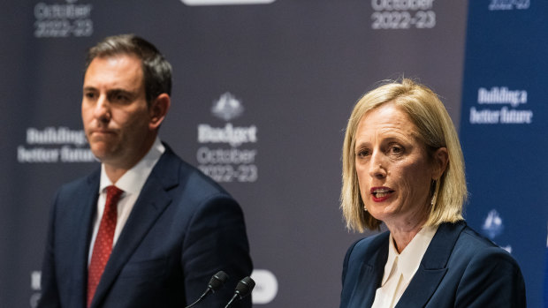 Finance Minister Katy Gallagher with Treasurer Jim Chalmers at the 2022-23 budget press conference. Strong revenues and lower spending means the budget deficit is $20.5 billion lower than expected.