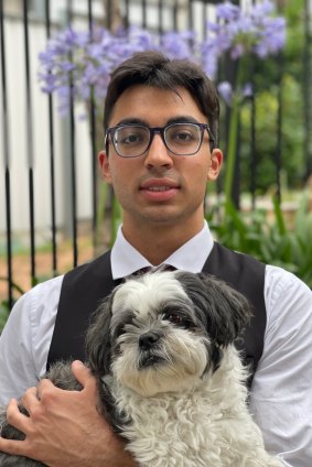 Rishi Arora from Normanhurst Boys High School and his dog Scruffy.