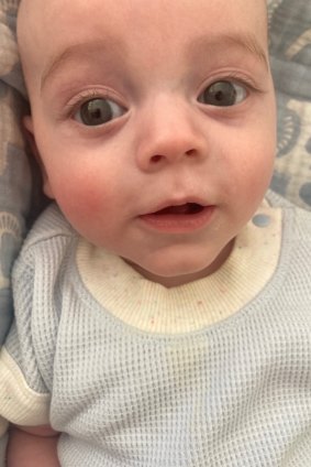 Baby Angus, born to surrogate mother Jennifer McCloy, is now legally part of the family of his biological parents, Edwina and Charlie Peach.
