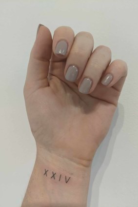 Lara Melrose, 32, has the number 24 in Roman numerals tattooed onto her wrist. It represents the day she met her husband, the day she got married and the day she lost her pregnancy.