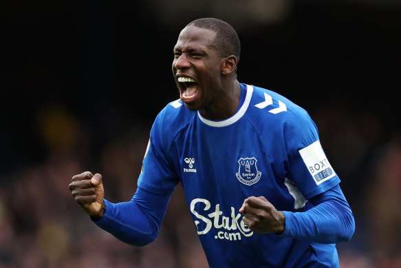 Abdoulaye Doucoure celebrates following their sides victory.