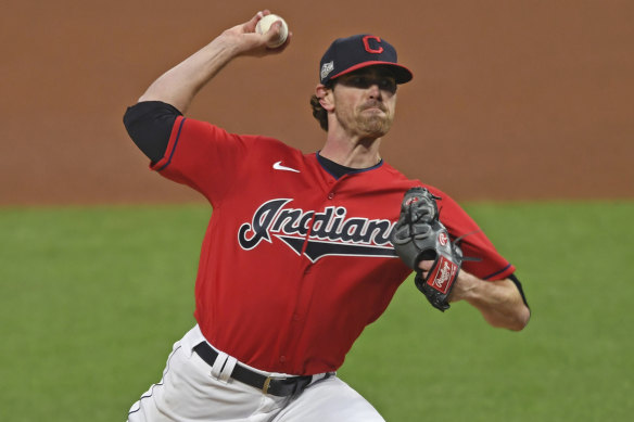 Cleveland Indians starting pitcher Shane Bieber, whose cap shows the 'C' logo adopted by the Major League Baseball outfit after they abandoned the controversial Chief Wahoo mascot.