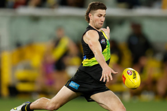 Tigers coach Damien Hardwick wants the club to re-sign Liam Baker as soon as possible.