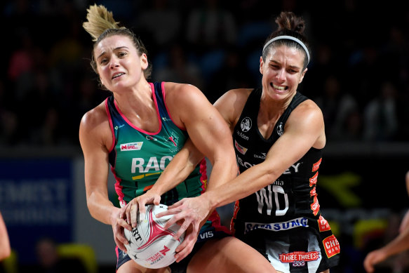 The Magpies' Ashleigh Brazill (right) clashes with the Vixens' Liz Watson.