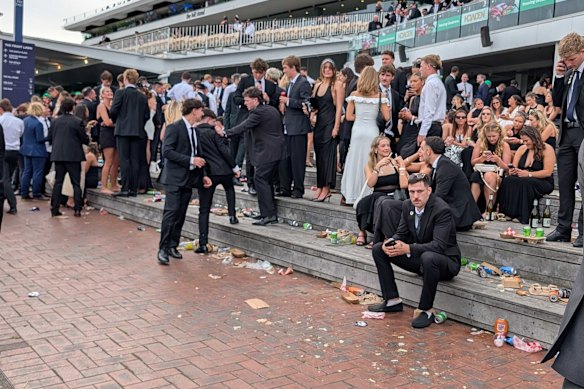 Punters keep partying after the last race at Flemington.