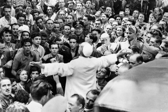 Pope Pius XII during an inspection of Rome after an American World War II air raid on August 13, 1943.