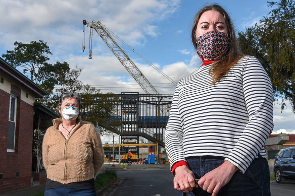 Coburg residents Tanya Pittard (right) and Jenny want the noisiest construction paused at night.
