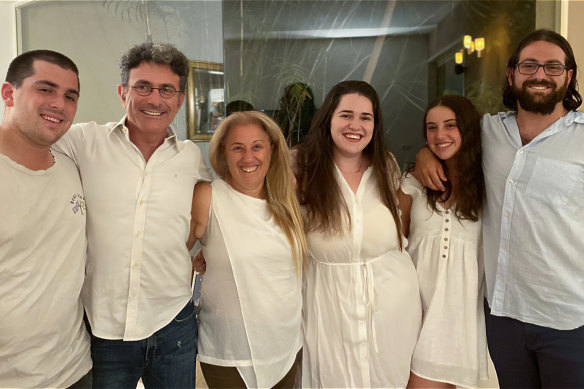 Lisa Segelov, an Australian woman living in Israel, pictured with her family. Three of her children have been called up for military service. From left: Tomer, 22, operations soldier in tank unit, husband Natie, 55, Lisa, 58, Maya, 25, Lior, 19, elite combat unit, and Avi, 27, combat tank unit. 