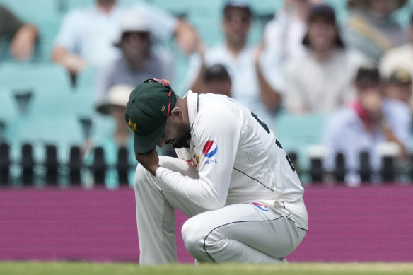 Babar Azam drops his head after yet another dropped catch.