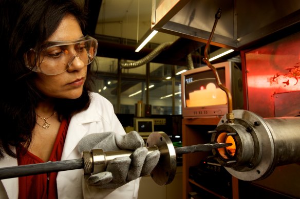 Professor Veena Sahajwalla, at a laboratory furnace at the UNSW SMaRT Centre.
