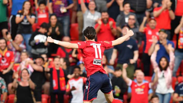 Double delight: Craig Goodwin celebrates after scoring one of his two terrific goals in the FFA Cup final.