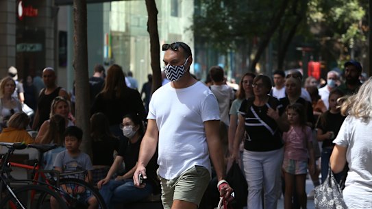 Health authorities are urging people to wear masks in crowded public spaces, such as shops, even if it’s not mandated.