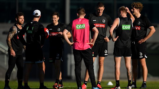 Pies players at training on Monday morning.