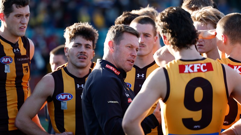 Footy heads run for the record books after Hawks mount 12-goal comeback and lose