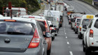 Your drive to work could soon be part of your employer’s carbon footprint.