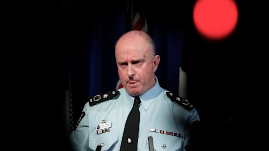 Acting Australian Federal Police commissioner Neil Gaughan fields questions over the raids. 