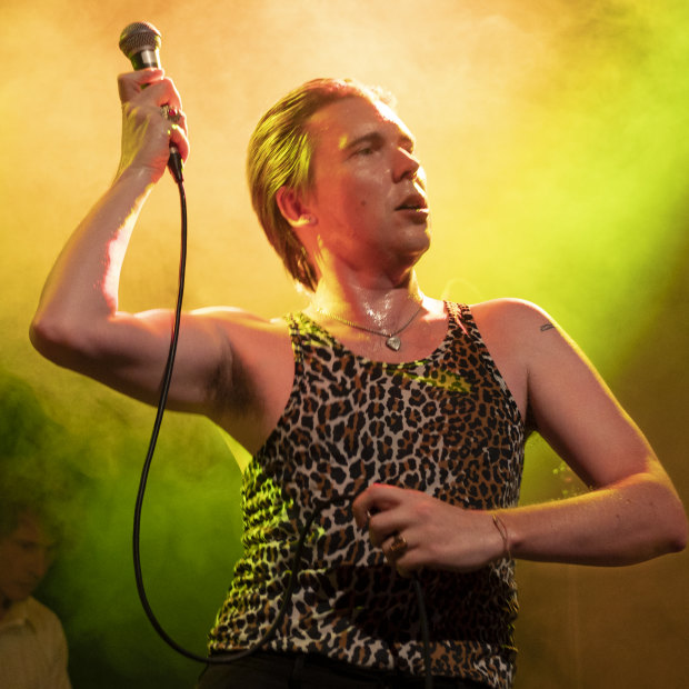 Alex Cameron performing in
Sydney in late 2022. “I write about the outlier, the table-for-one guy whose life is a constellation of microscopic tragedies.”