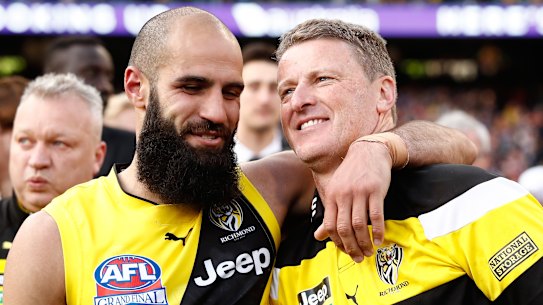 Bachar Houli (left) with coach Damien Hardwick after Richmond’s 2017 grand final win.