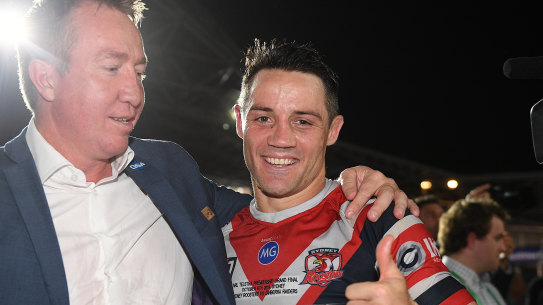 Trent Robinson and Cooper Cronk of the Sydney Roosters celebrate grand final success again.
