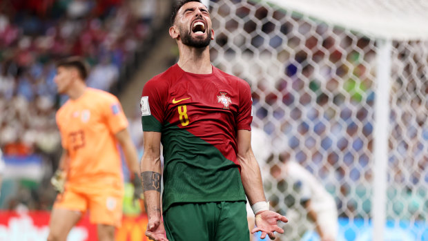 World Cup as it happened: Portugal beats Uruguay 2-0 as Bruno Fernandes stars; pitch invader carries rainbow flag across pitch