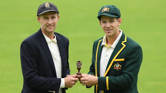 England captain Joe Root with the Ashes and Australian skipper Tim Paine.