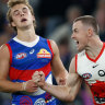 Swans cling on as brave Bulldogs suffer heavy injury toll