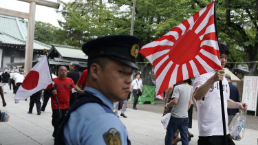 The rising sun flag is displayed at Tokyo's Yasukuni Shrine, which is dedicated to the memory of Japan's war dead.
