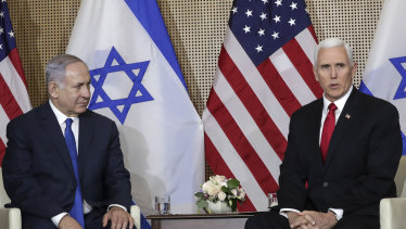 US Vice President Mike Pence, right, and Israeli Prime Minister Benjamin Netanyahu, front the media in Warsaw, Poland.
