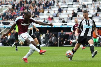 Michail Antonio scores for West Ham against Newcastle at St James Park on Sunday.