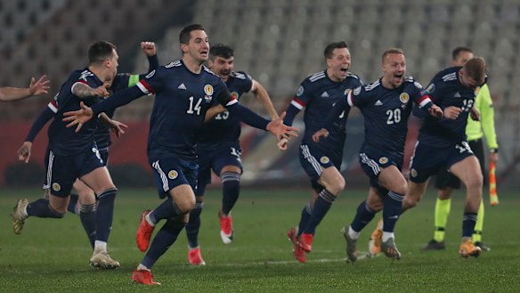 Scotland celebrate their penalty shootout victory over Serbia at the Rajko Mitic stadium in Belgrade which earned them qualification for the Euros, after a 23-year absence from major men’s tournaments.