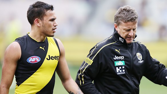Richmond coach Damien Hardwick with young Tiger Sydney Stack, in 2019.