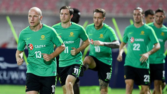 Members of the Socceroos squad train in Kuwait ahead of the qualifier.