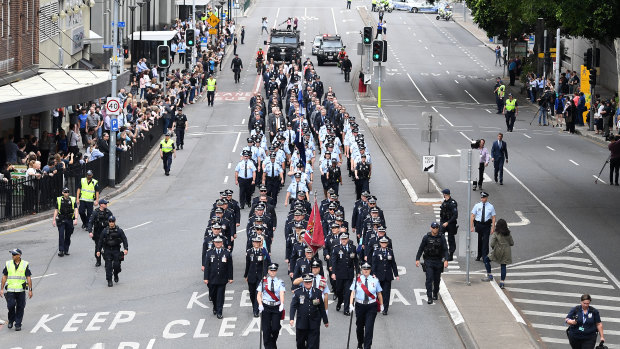 Members of the Queensland Police take part in a National Police Remembrance Day parade in Brisbane.