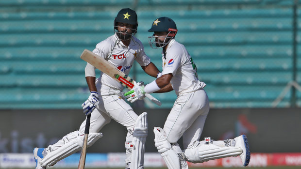 Babar Azam and Abdullah Shafique in action on day four of the second Test in Karachi. 