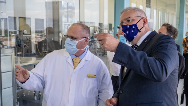 Prime Minister Scott Morrison visits a CSL lab in Melbourne this month. 