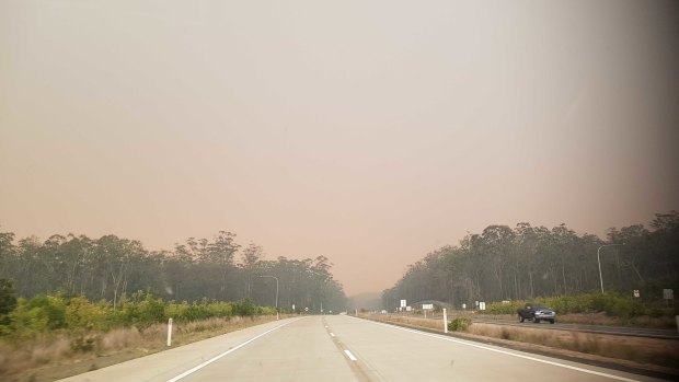 A near-deserted Pacific Highway near Port Macquarie as it was closing this afternoon. 